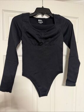 OQQ Woman’s Black Long Sleeve One-Piece Bodysuit